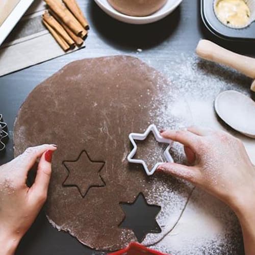 cutting star shaped cookie dough
