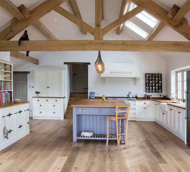 open plan kitchen with wood fixtures