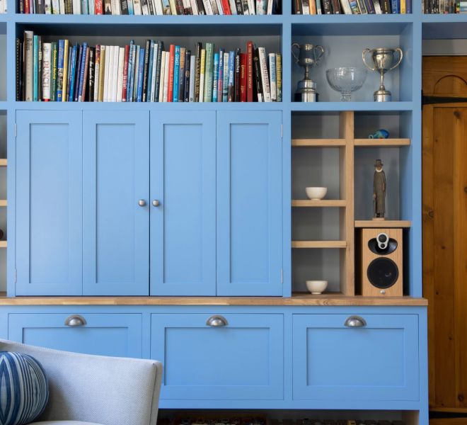 room view of blue fitted cabinets with closed doors